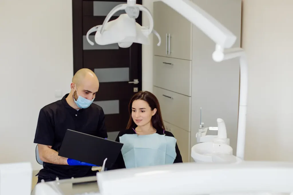 A woman being shown her dental records